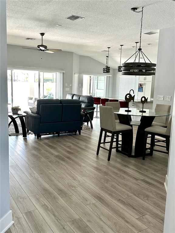 Dining room, Interior, Living room, Pendant Lights, Wood Texture Flooring