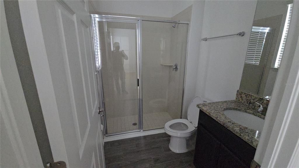 Bathroom, Glass Shower, Interior, Wood Texture Flooring