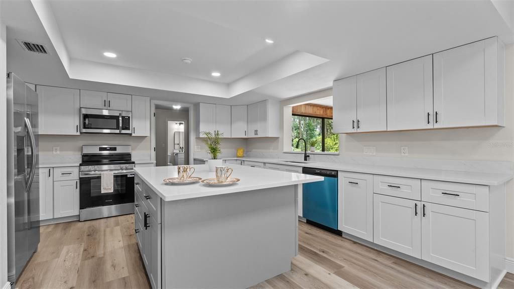 Interior, Kitchen, Recessed Lighting, Stainless Steel Appliances, Wood Texture Flooring