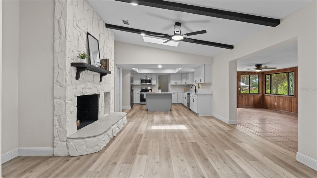 Fireplace, Interior, Kitchen, Recessed Lighting, Wood Texture Flooring