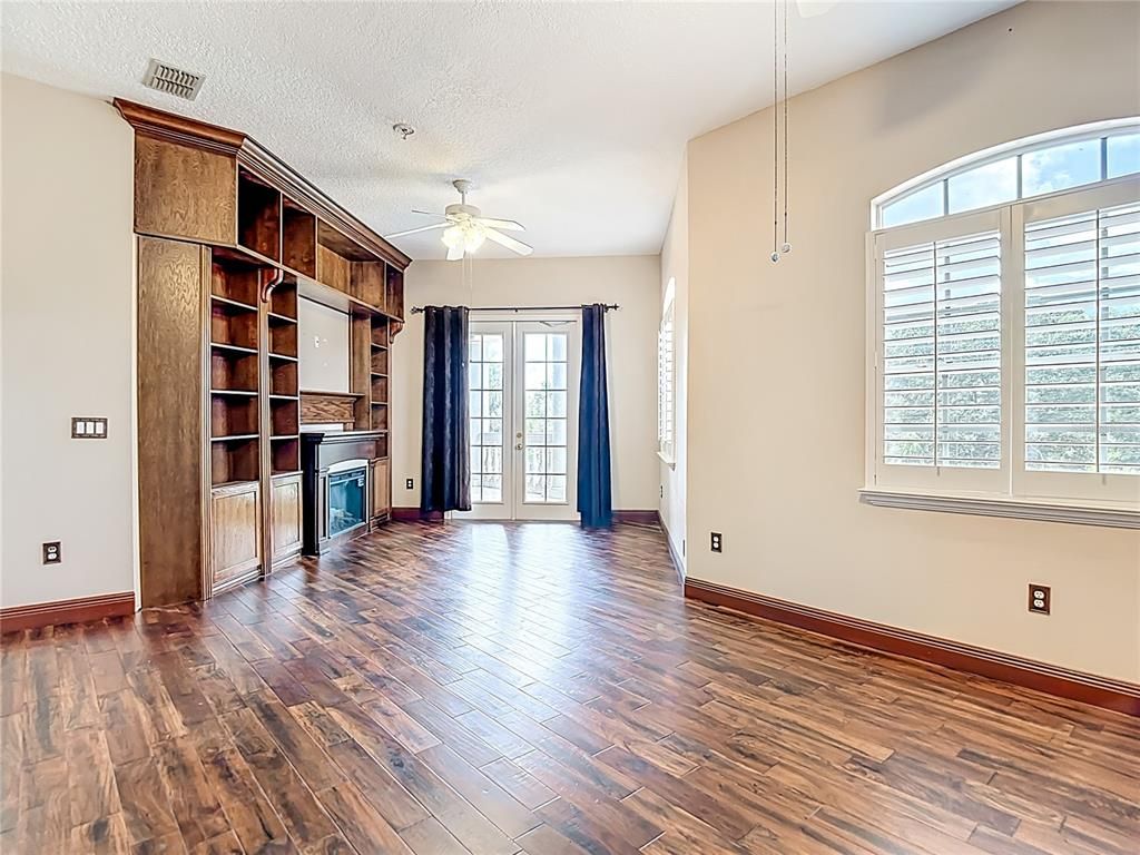 Empty room, Fireplace, Interior, Pendant Lights, Wood Texture Flooring