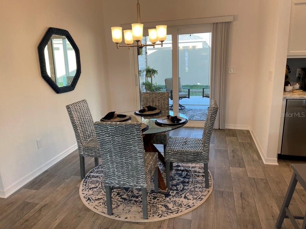 Chandelier, Dining room, Interior, Wood Texture Flooring