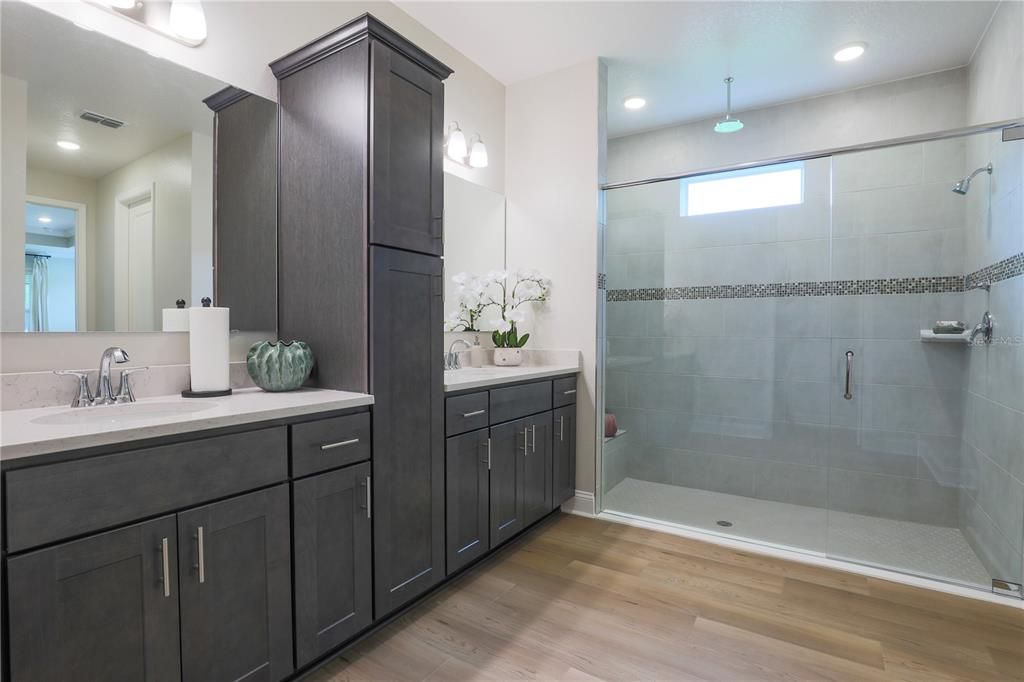 Bathroom, Dual Sink Vanities, Glass Shower, Interior, Recessed Lighting, Wood Texture Flooring