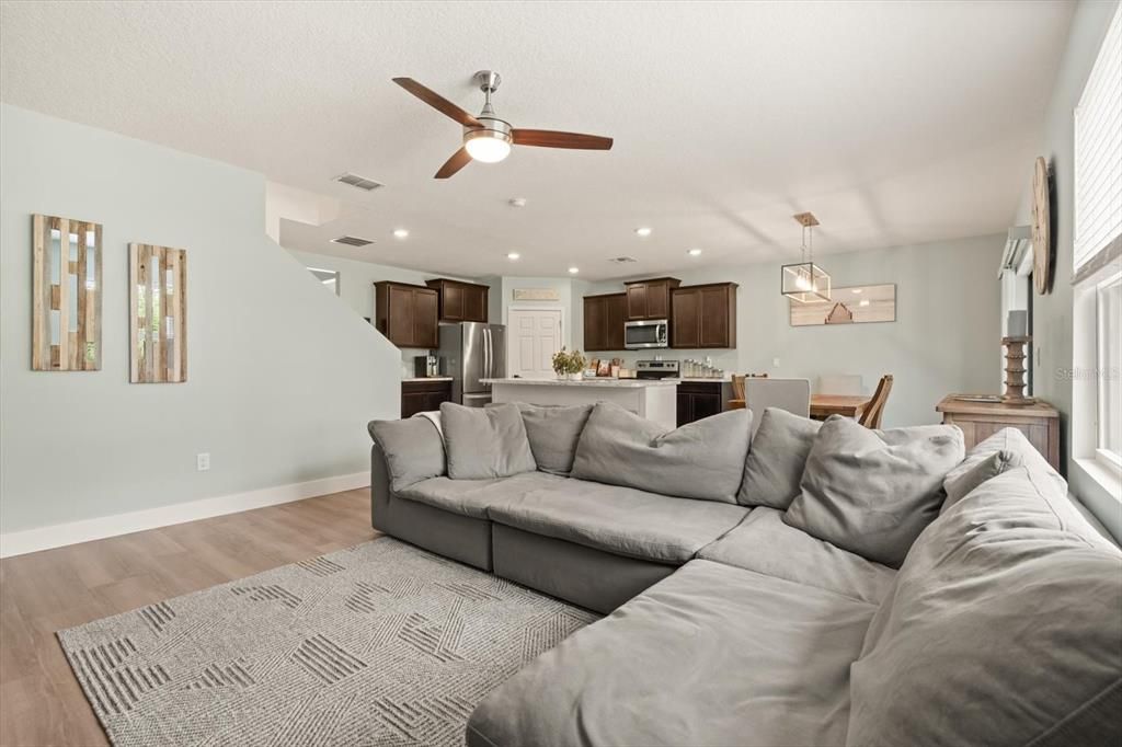 Dining room, Interior, Kitchen, Living room, Pendant Lights, Recessed Lighting, Stainless Steel Appliances, Wood Texture Flooring