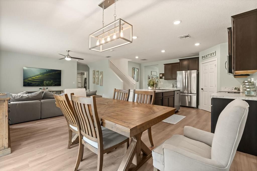 Dining room, Interior, Kitchen, Living room, Pendant Lights, Recessed Lighting, Stainless Steel Appliances, Wood Texture Flooring