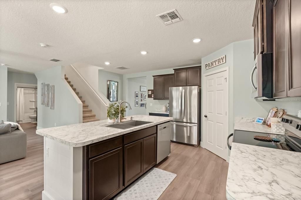 Interior, Kitchen, Recessed Lighting, Stainless Steel Appliances, Wood Texture Flooring