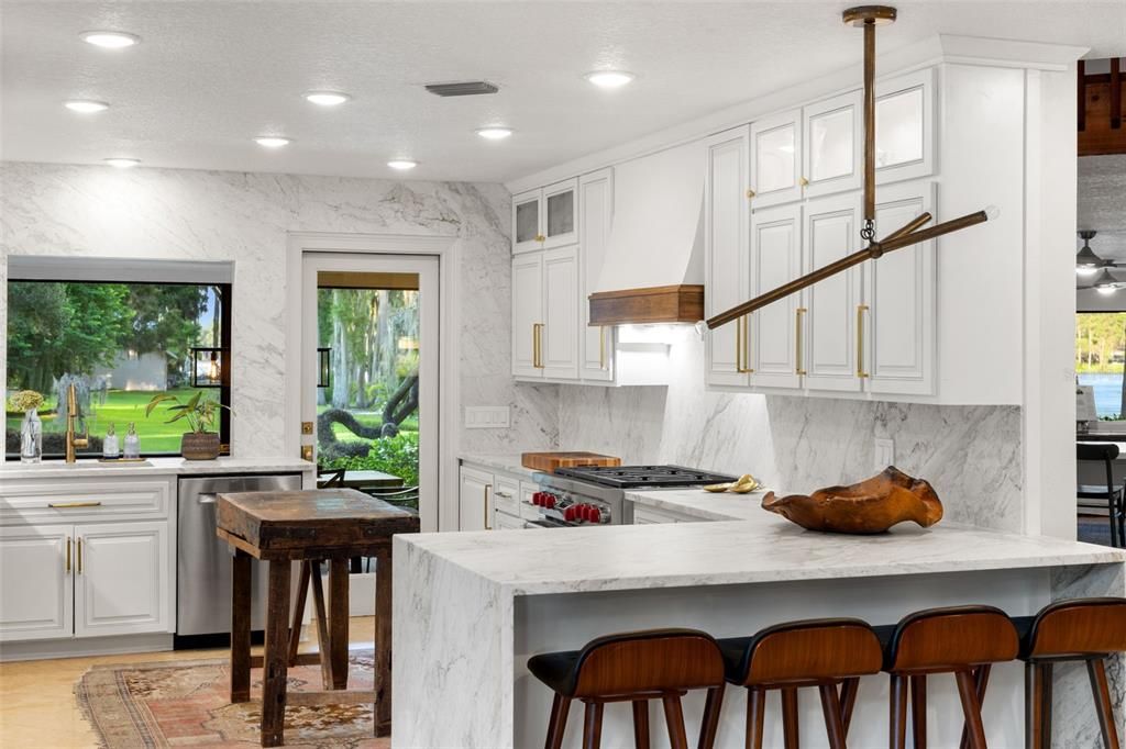 Interior, Kitchen, Marble Walls, Recessed Lighting, Stainless Steel Appliances