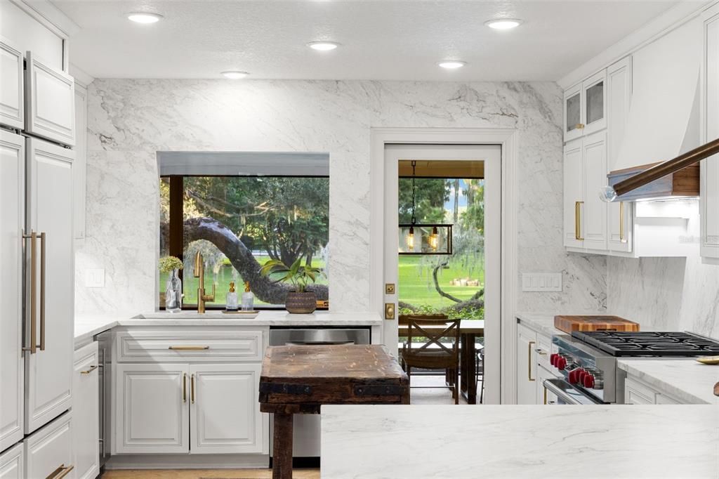 Interior, Kitchen, Marble Walls, Recessed Lighting, Stainless Steel Appliances, Wood Texture Flooring