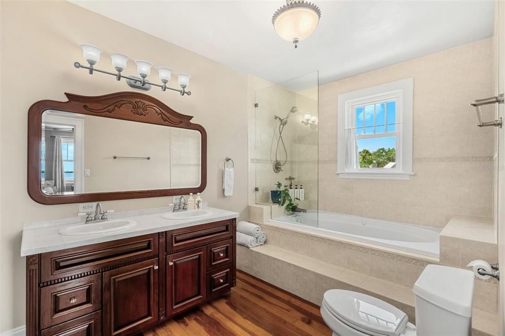 Bathroom, Dual Sink Vanities, Glass Shower, Interior, Wood Texture Flooring