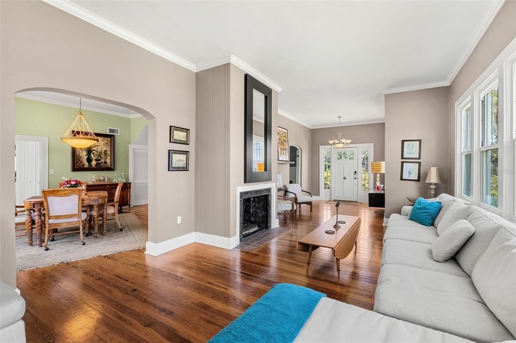 Chandelier, Dining room, Fireplace, Interior, Living room, Pendant Lights, Wood Texture Flooring