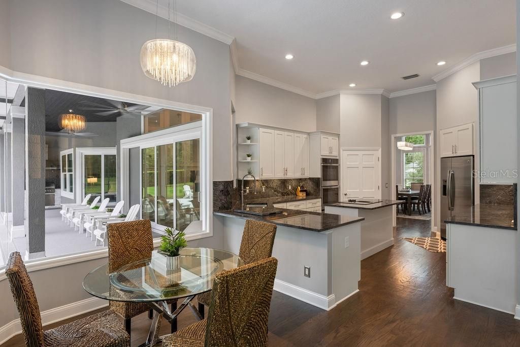 Chandelier, Dining room, Interior, Kitchen, Pendant Lights, Recessed Lighting, Wood Texture Flooring