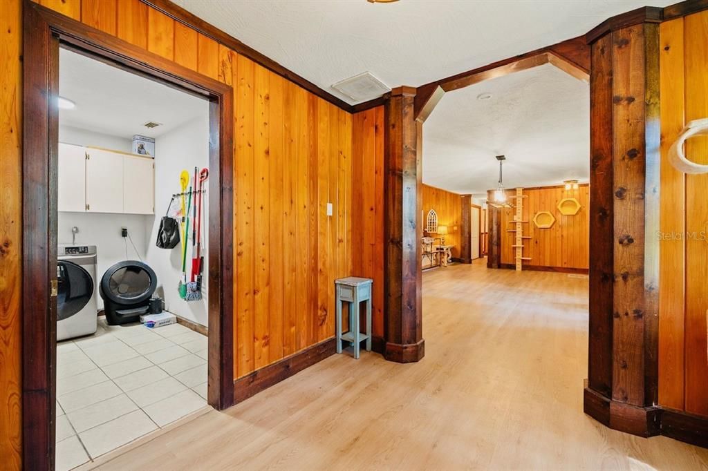 Interior, Kitchen, Washer, Wood Texture Flooring, Wooden Walls