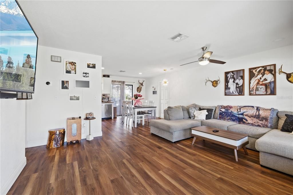 Chandelier, Dining room, Interior, Kitchen, Living room, Recessed Lighting, Wood Texture Flooring