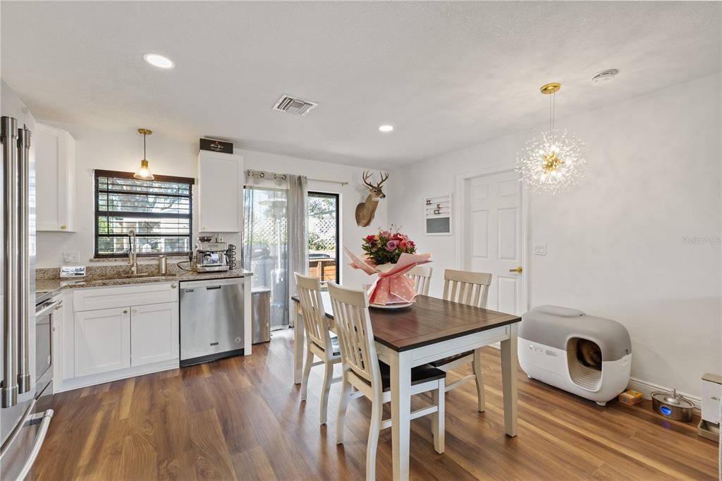 Chandelier, Dining room, Interior, Kitchen, Pendant Lights, Recessed Lighting, Wood Texture Flooring