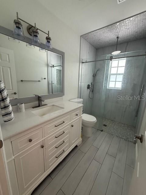 Bathroom, Dual Sink Vanities, Glass Shower, Interior, Wood Texture Flooring