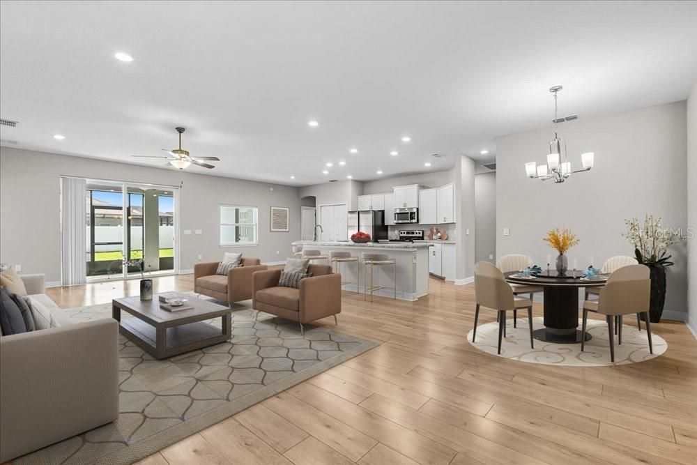 Chandelier, Dining room, Interior, Kitchen, Living room, Pendant Lights, Recessed Lighting, Stainless Steel Appliances, Wood Texture Flooring