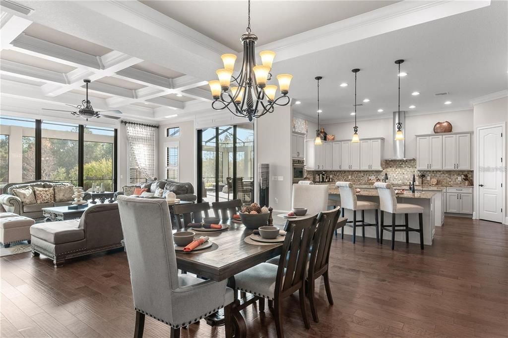 Chandelier, Dining room, Interior, Kitchen, Living room, Pendant Lights, Recessed Lighting, Wood Texture Flooring