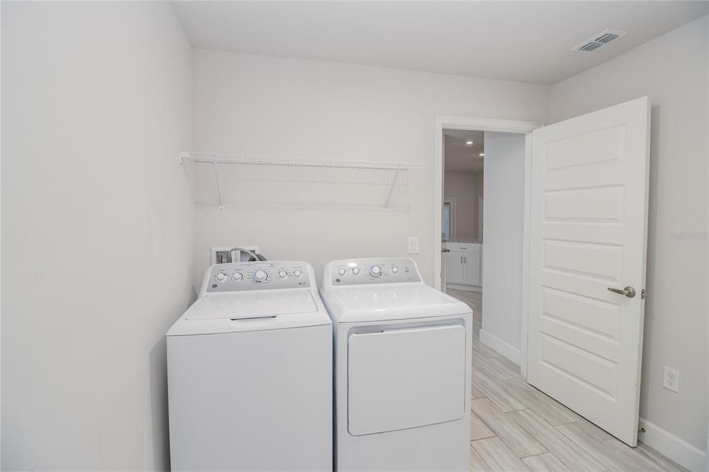 Interior, Recessed Lighting, Utility Closets, Washer, Wood Texture Flooring