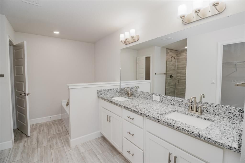 Bathroom, Dual Sink Vanities, Interior, Recessed Lighting, Wood Texture Flooring