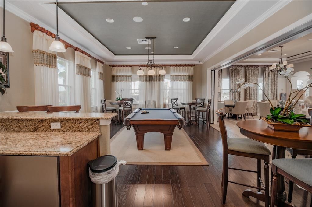 Billiard Table, Chandelier, Dining room, Game Room, Interior, Pendant Lights, Recessed Lighting, Wood Texture Flooring