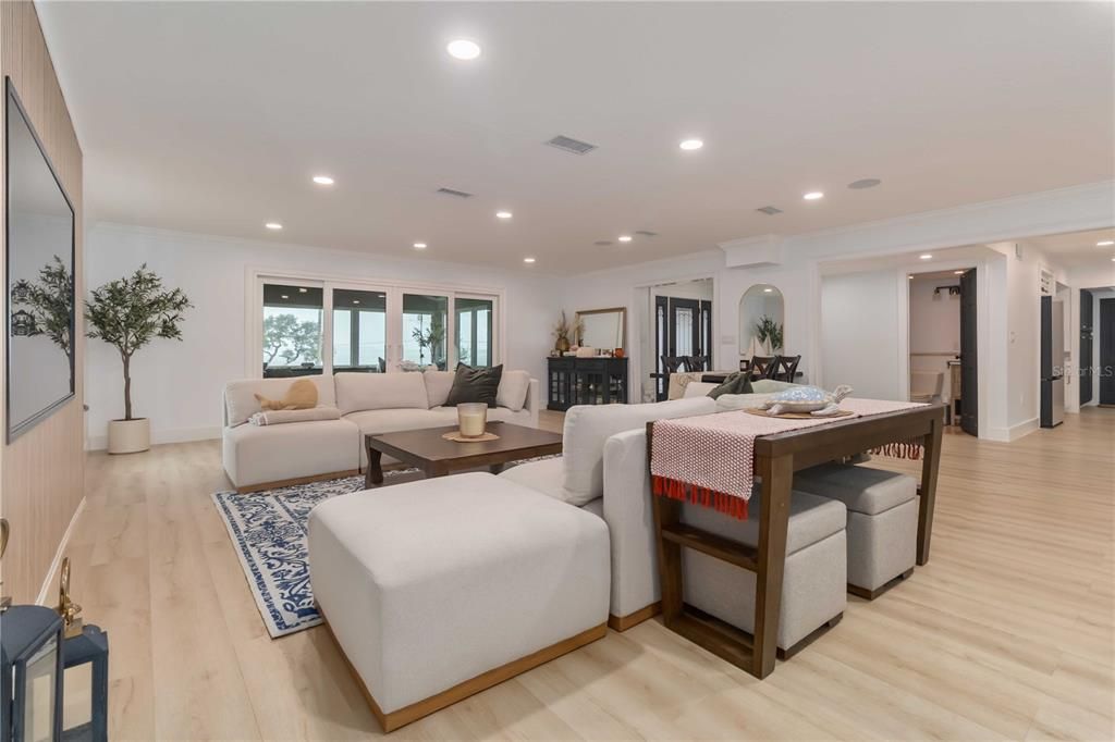 Dining room, Fireplace, Interior, Living room, Recessed Lighting, Wood Texture Flooring