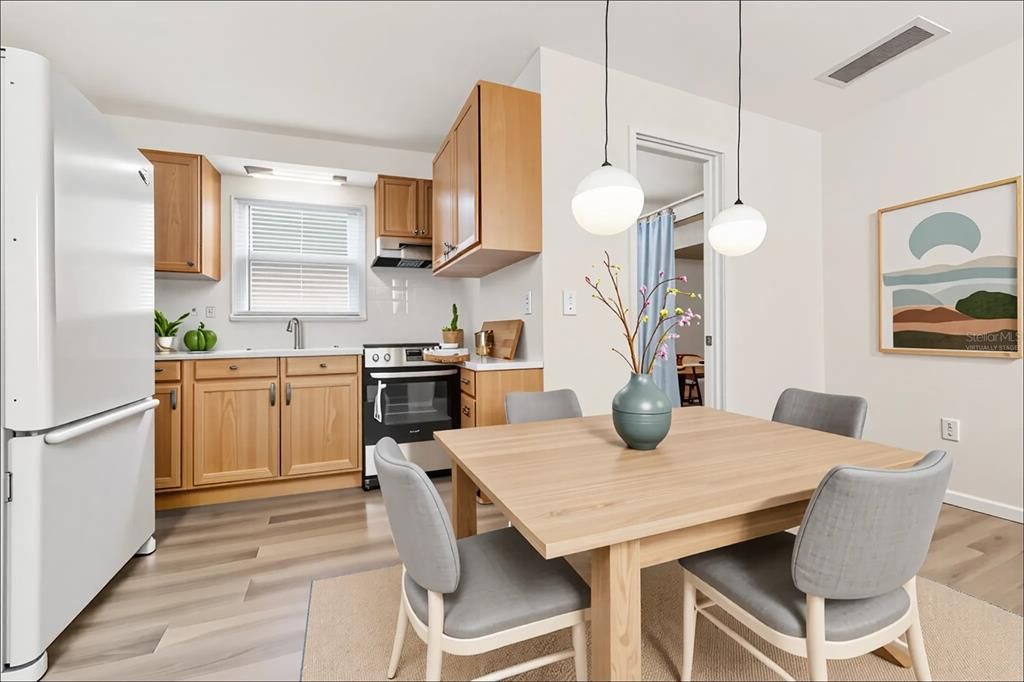 Dining room, Interior, Kitchen, Pendant Lights, Stainless Steel Appliances, Wood Texture Flooring