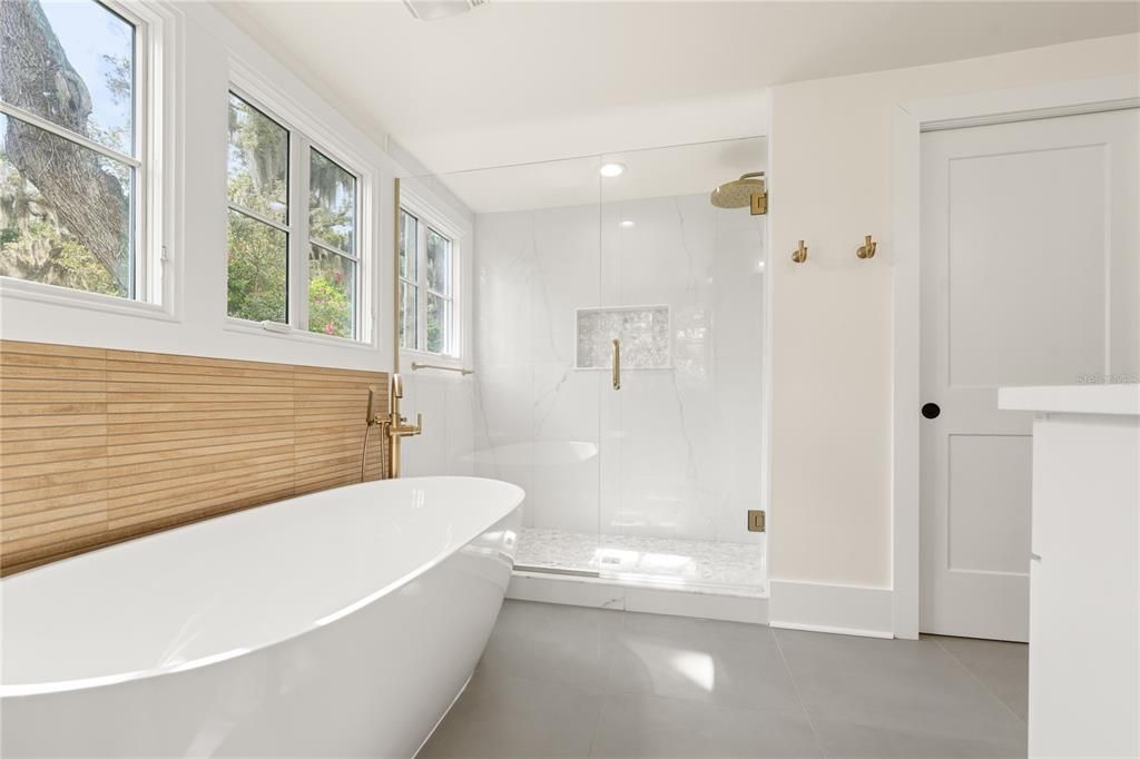 Bathroom, Free Standing Baths, Glass Shower, Interior, Marble Walls, Recessed Lighting
