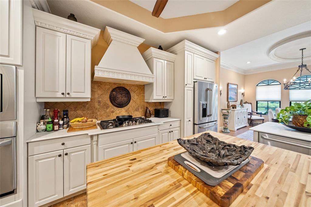 Chandelier, Interior, Kitchen, Pendant Lights, Recessed Lighting, Stainless Steel Appliances, Wood Texture Flooring