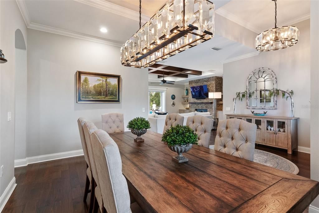 Dining room, Fireplace, Interior, Living room, Pendant Lights, Recessed Lighting, Wood Texture Flooring