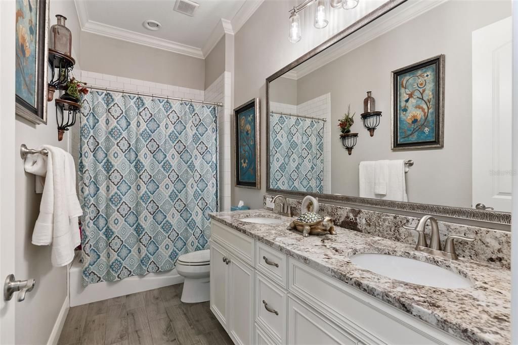Bathroom, Dual Sink Vanities, Interior, Recessed Lighting, Wood Texture Flooring