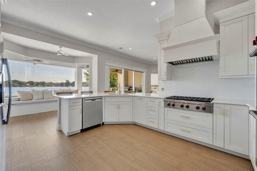 Interior, Kitchen, Recessed Lighting, Stainless Steel Appliances, Water, Wood Texture Flooring