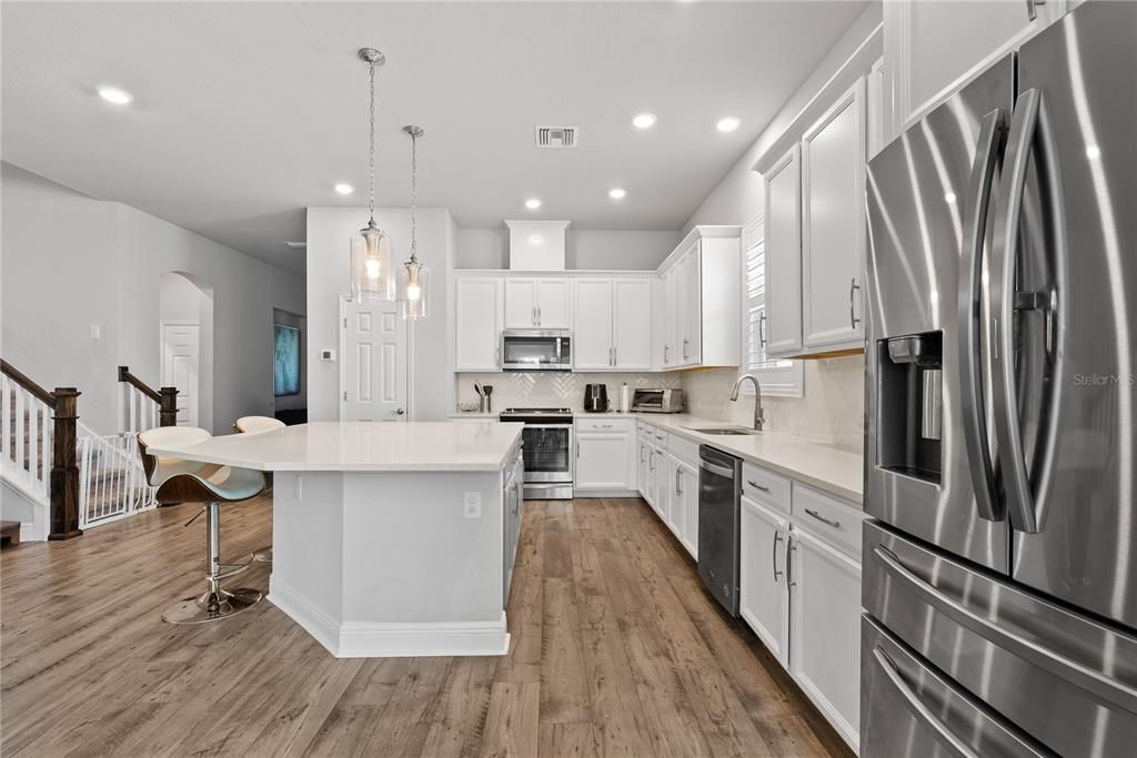 Interior, Kitchen, Pendant Lights, Recessed Lighting, Stainless Steel Appliances, Wood Texture Flooring