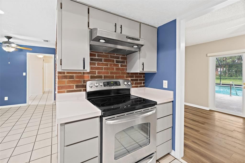 Interior, Kitchen, Stainless Steel Appliances, Stone Walls, Wood Texture Flooring