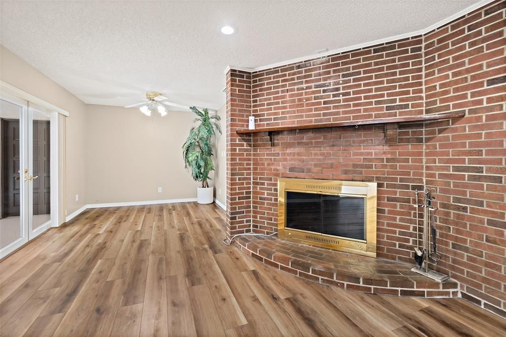 Fireplace, Interior, Recessed Lighting, Stone Walls, Wood Texture Flooring