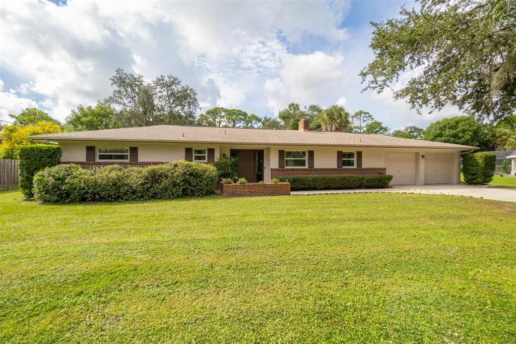 Attached, Backyard, Exterior, Facade, Brick Facade, Ranch