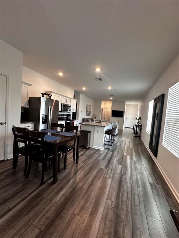 Dining room, Interior, Kitchen, Recessed Lighting, Stainless Steel Appliances, Wood Texture Flooring