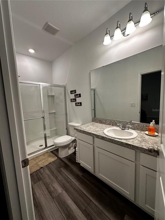 Bathroom, Glass Shower, Interior, Recessed Lighting, Wood Texture Flooring