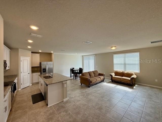 Dining room, Interior, Kitchen, Living room, Recessed Lighting, Stainless Steel Appliances