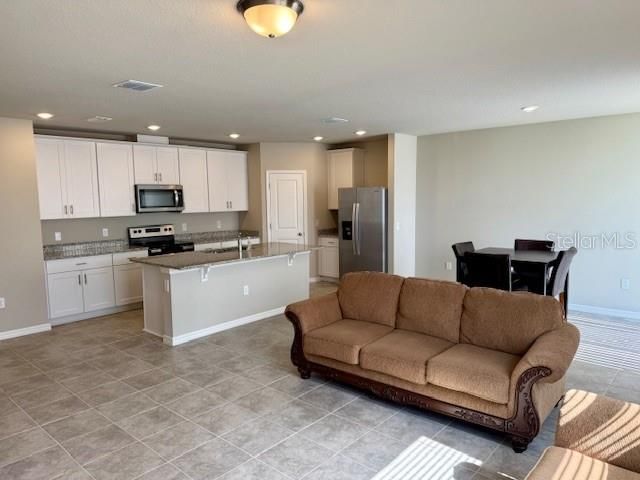 Dining room, Interior, Kitchen, Living room, Recessed Lighting, Stainless Steel Appliances