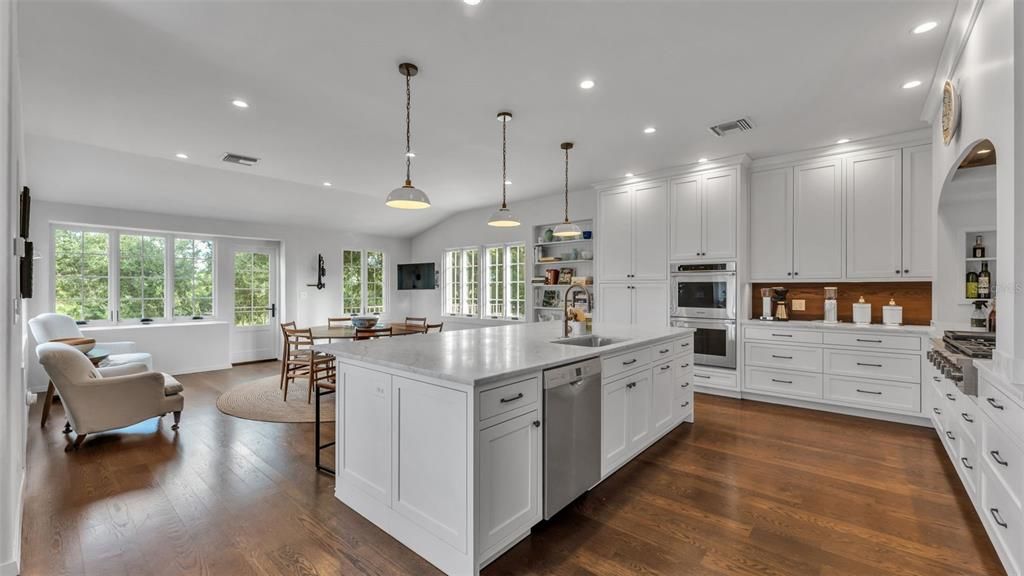 Dining room, Interior, Kitchen, Pendant Lights, Recessed Lighting, Stainless Steel Appliances, Wood Texture Flooring