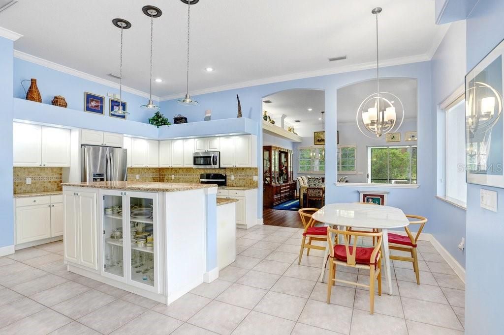 Chandelier, Dining room, Interior, Kitchen, Pendant Lights, Recessed Lighting, Stainless Steel Appliances