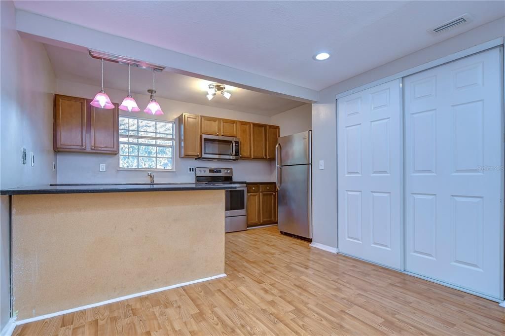 Interior, Kitchen, Pendant Lights, Recessed Lighting, Stainless Steel Appliances, Wood Texture Flooring