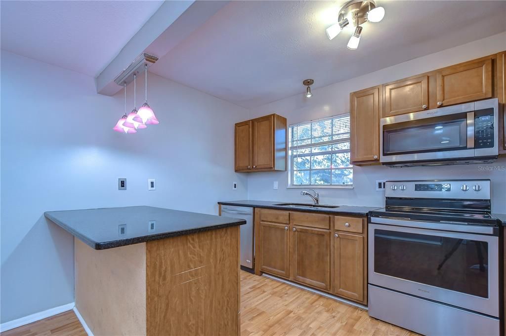 Interior, Kitchen, Pendant Lights, Stainless Steel Appliances, Wood Texture Flooring