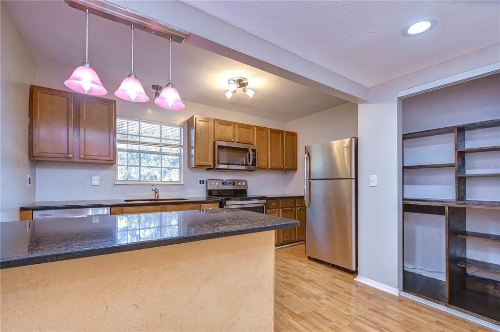 Interior, Kitchen, Pendant Lights, Recessed Lighting, Stainless Steel Appliances, Wood Texture Flooring