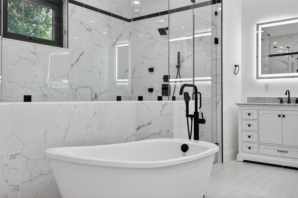 Bathroom, Free Standing Baths, Glass Shower, Interior, Marble Walls, Recessed Lighting