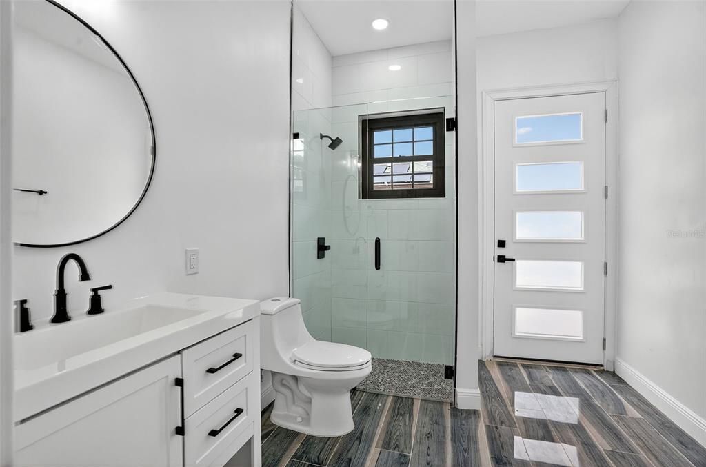 Bathroom, Glass Shower, Interior, Recessed Lighting, Wood Texture Flooring