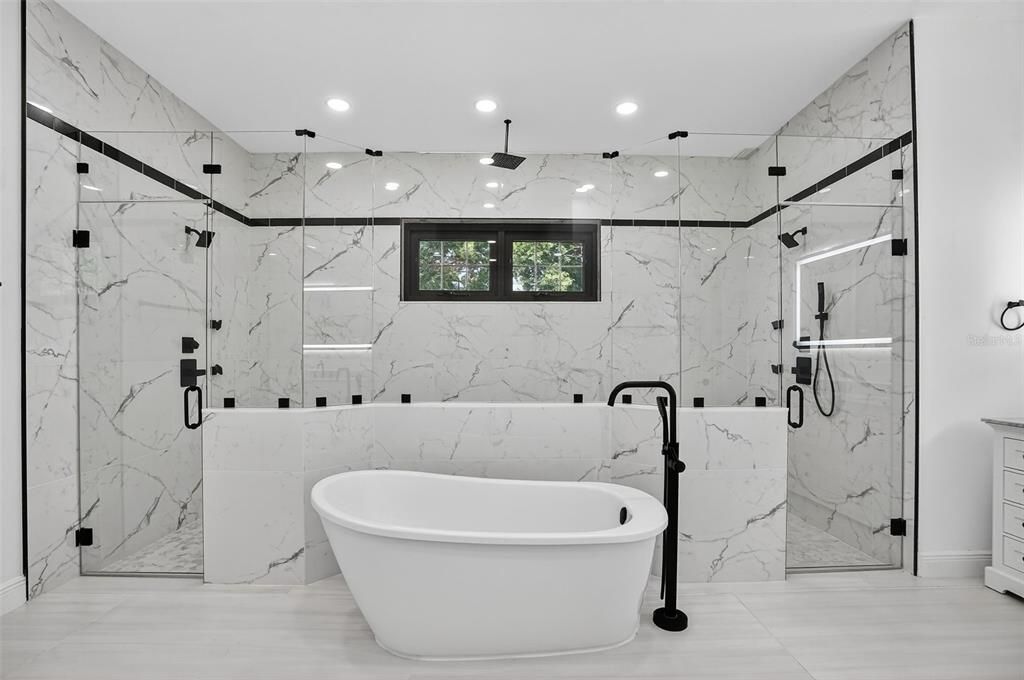 Bathroom, Free Standing Baths, Glass Shower, Interior, Marble Walls, Recessed Lighting