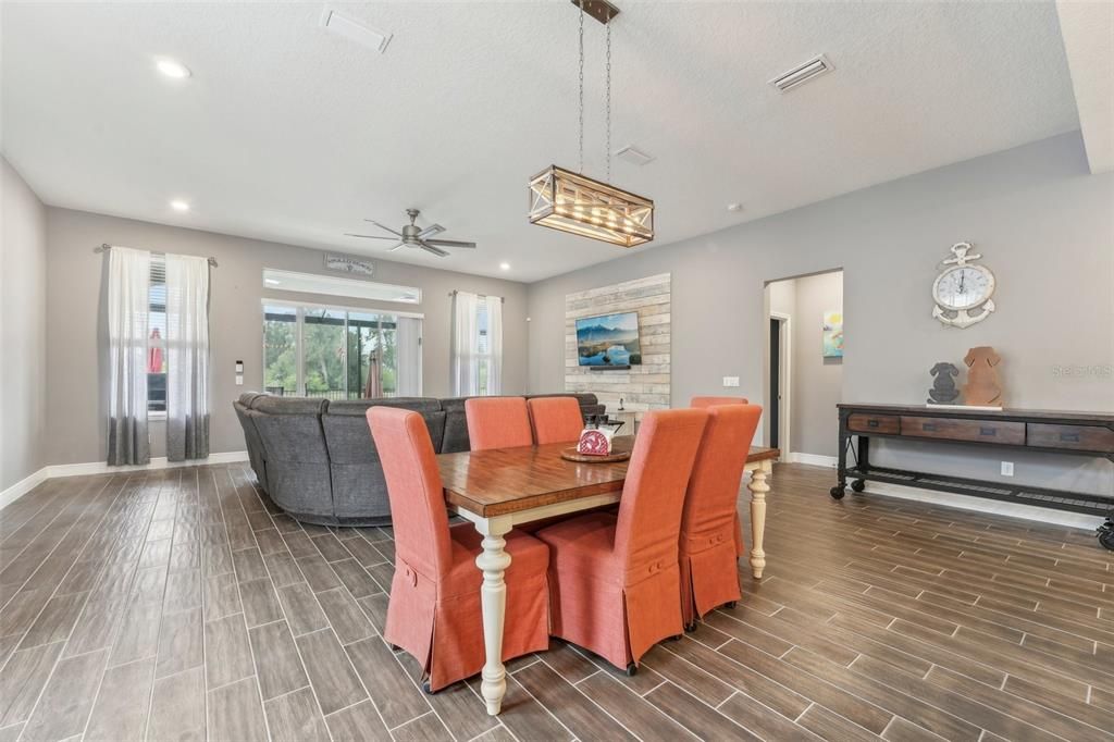 Dining room, Interior, Pendant Lights, Recessed Lighting, Stone Walls, Wood Texture Flooring