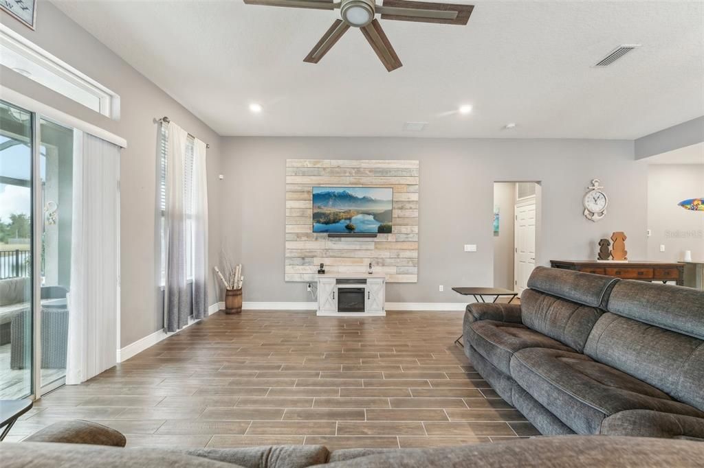 Fireplace, Interior, Living room, Recessed Lighting, Wood Texture Flooring