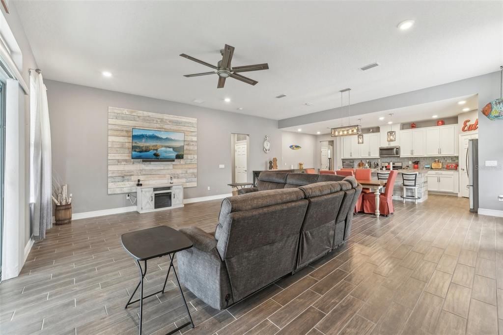 Dining room, Interior, Kitchen, Living room, Pendant Lights, Recessed Lighting, Stainless Steel Appliances, Wood Texture Flooring